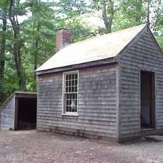 Thoreau's one-roomed cabin at Walden pond. The walls are shingled with cedar, with a small woodshed. Minimalists have more free time