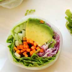 a vegan sushi roll with veggies